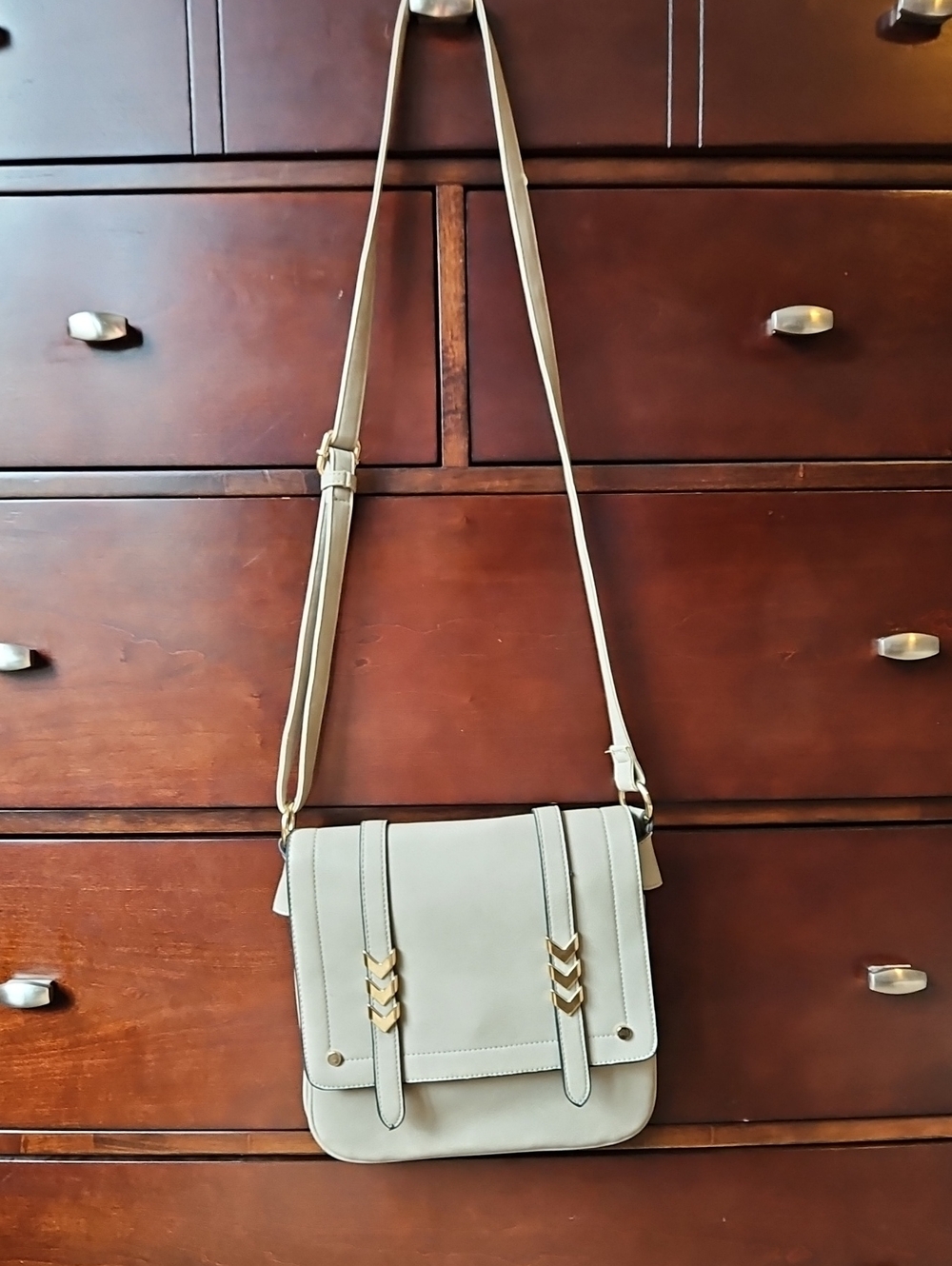 Stylish Cream Crossbody Bag with Gold Accents